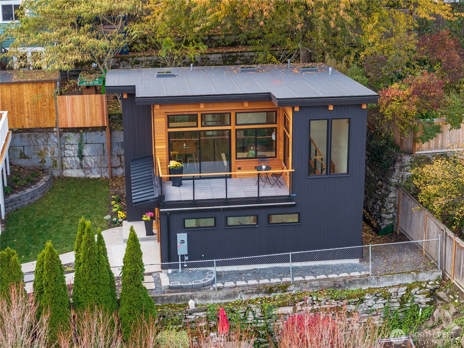 328 Northeast 55th Street Seattle, WA 98105 - Photo 28 of 35 a front view of a house with a yard