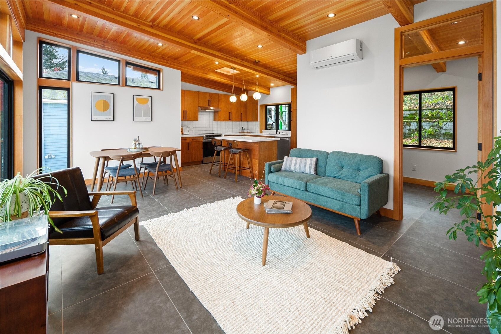 328 Northeast 55th Street Seattle, WA 98105 - Photo 3 of 35 a living room with furniture and a large window