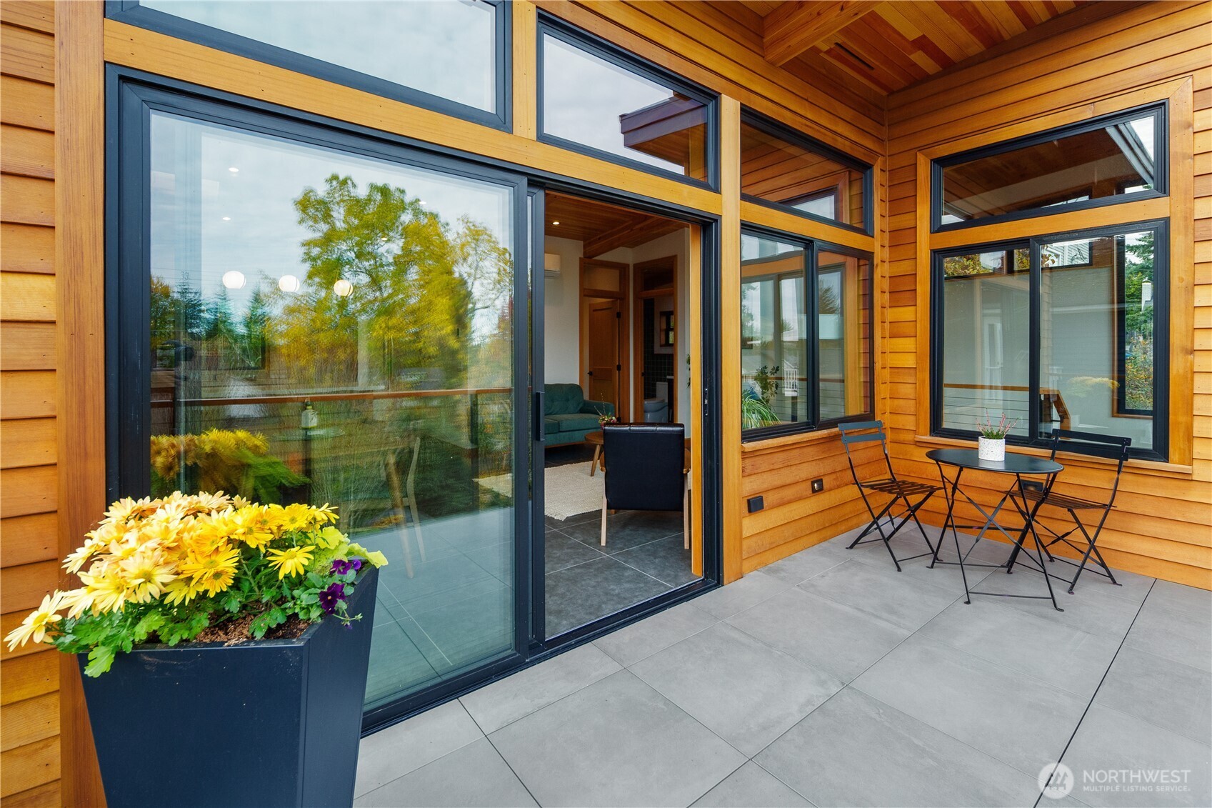 328 Northeast 55th Street Seattle, WA 98105 - Photo 8 of 35 a outdoor living area with furniture