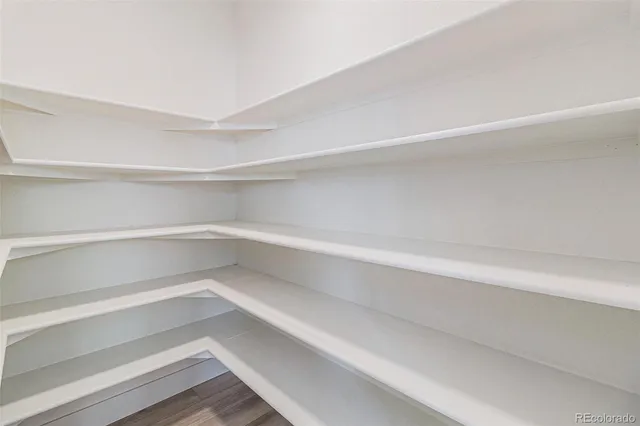 a storage room with wooden floor