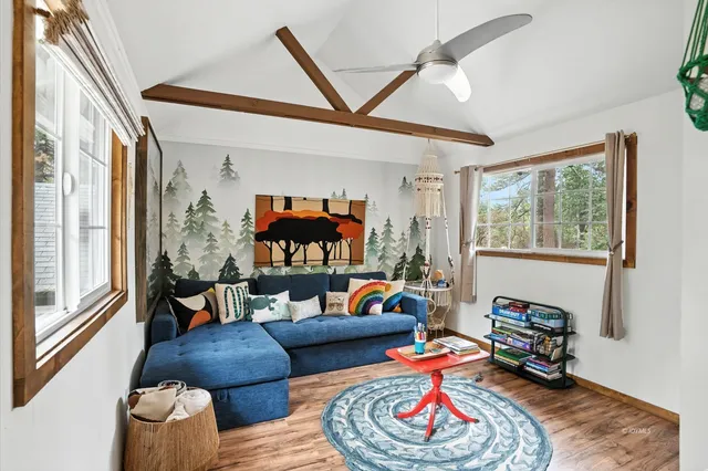 a bathroom with a bathtub a sink and a mirror