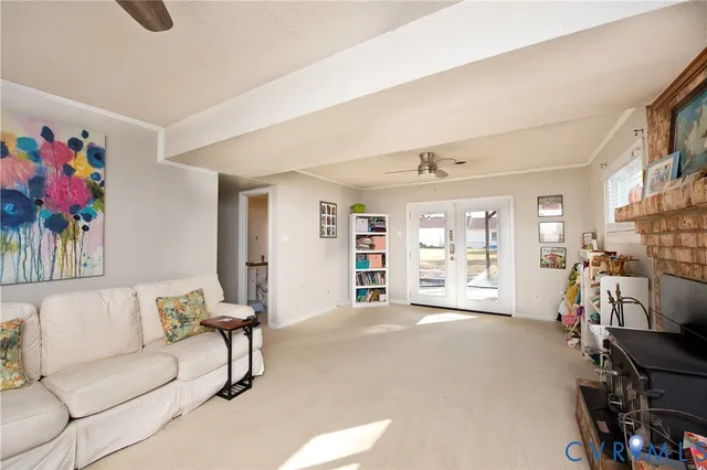 a view of a house with a backyard porch and sitting area
