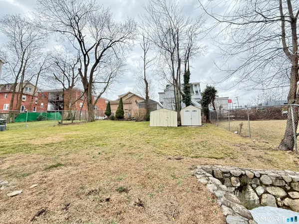 a house with trees in front of it