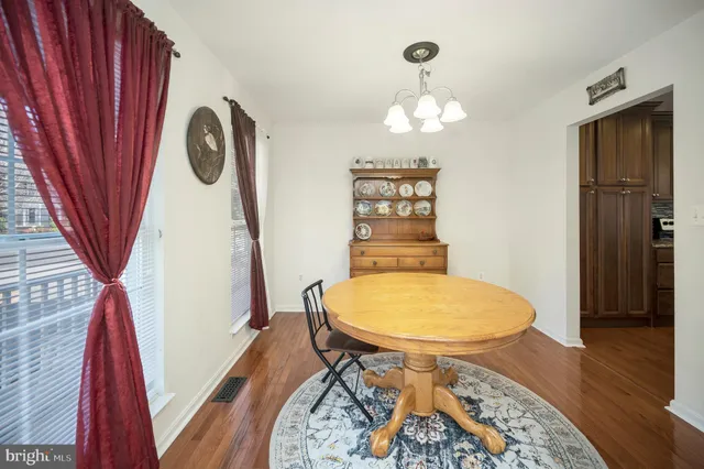 a view of a livingroom with furniture and wooden floor