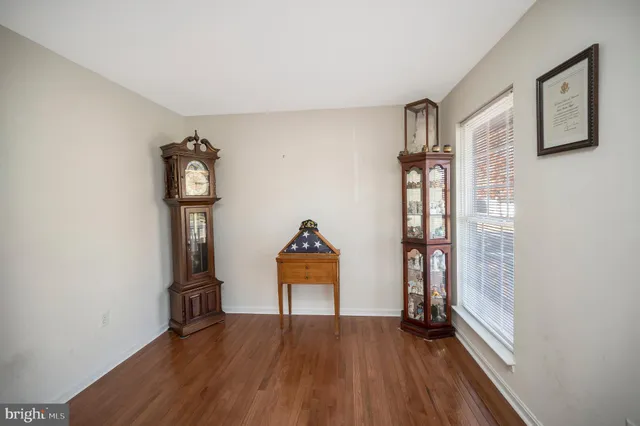 a view of a hallway with windows