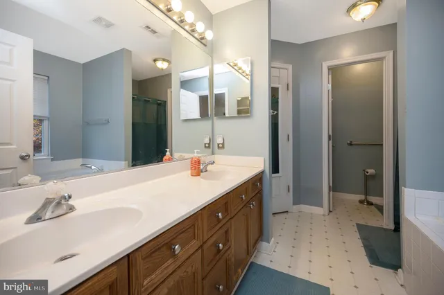 a white bath tub sitting in a bathroom