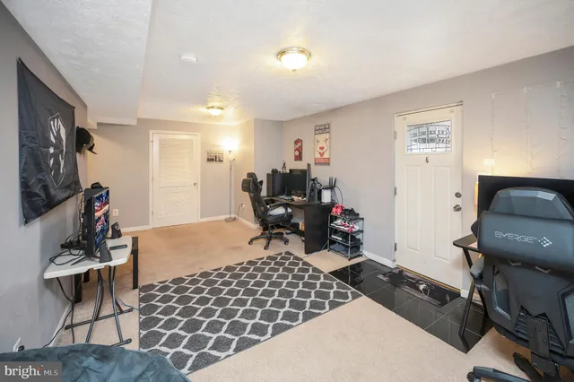 a room with furniture and a gym equipment