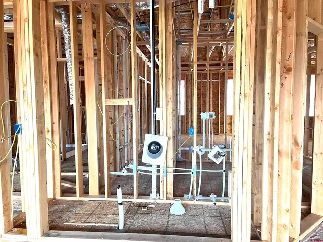 a view of spacious bedroom with a large window