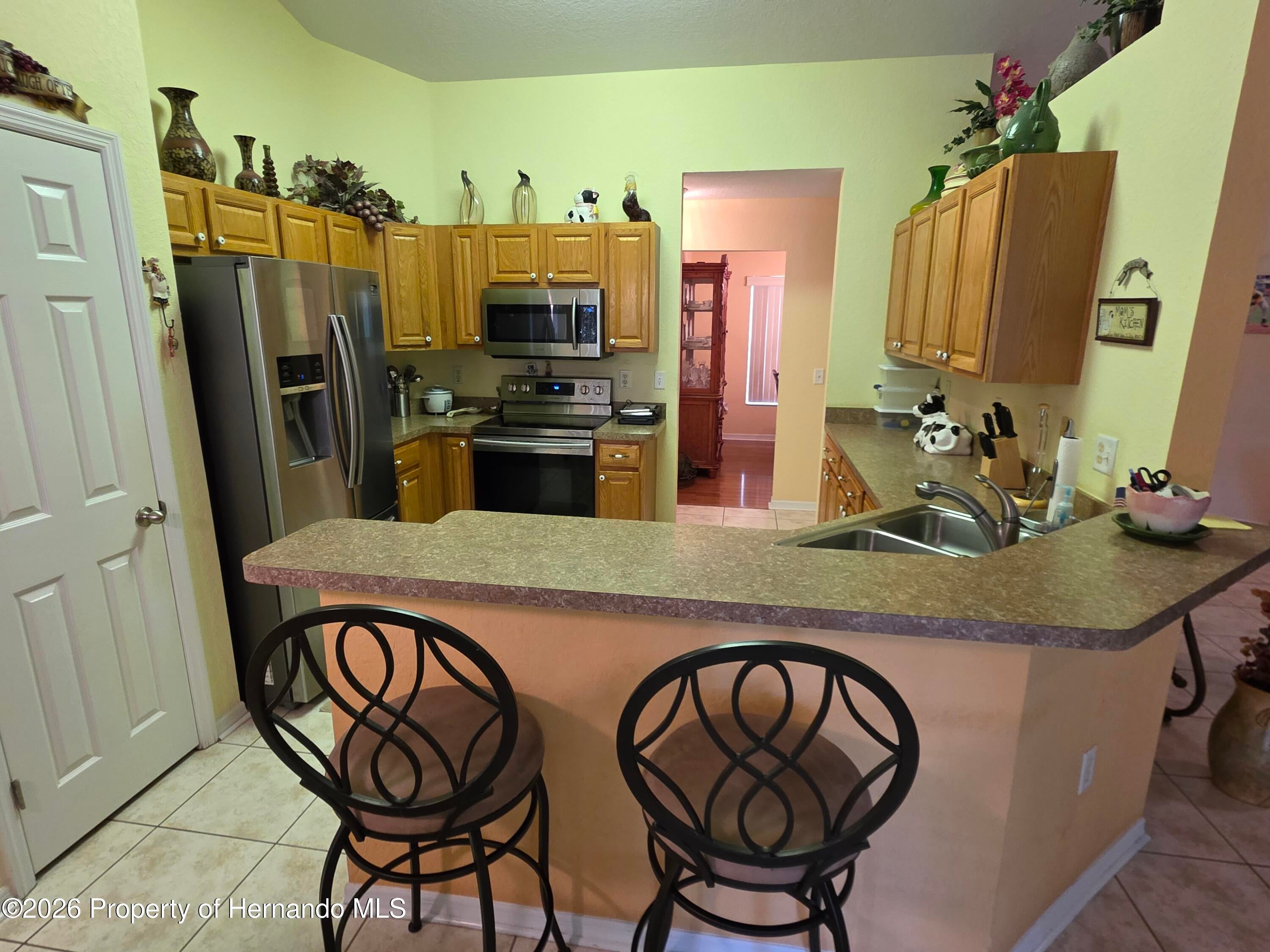 11026 Little Street Spring Hill, FL 34608 - Photo 4 of 27 Gallery Image 4