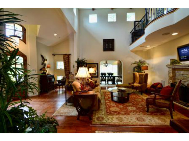 24337 San Juan Road Carmel, CA 93923 - Photo 11 of 25 a living room with fireplace furniture and a potted plant