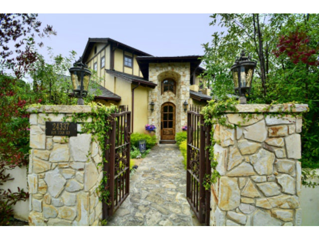 24337 San Juan Road Carmel, CA 93923 - Photo 2 of 25 a front view of a house with a yard