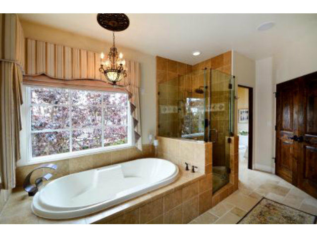 24337 San Juan Road Carmel, CA 93923 - Photo 21 of 25 a bathroom with a tub sink and mirror