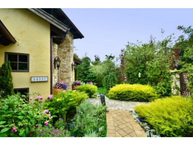 24337 San Juan Road Carmel, CA 93923 - Photo 3 of 25 a view of a garden