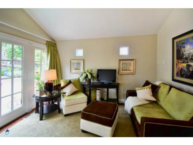 24337 San Juan Road Carmel, CA 93923 - Photo 6 of 25 a living room with furniture and a flat screen tv