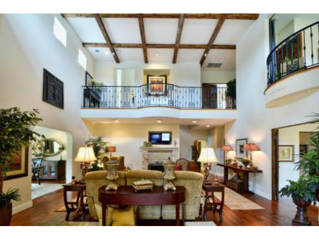 24337 San Juan Road Carmel, CA 93923 - Photo 10 of 25 a living room with fireplace furniture and a potted plant
