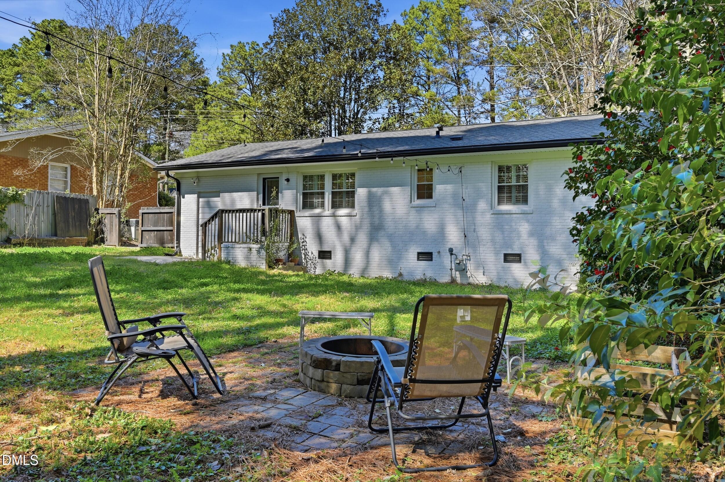 2744 Milburnie Road Raleigh, NC 27610 - Photo 26 of 33 fire pit