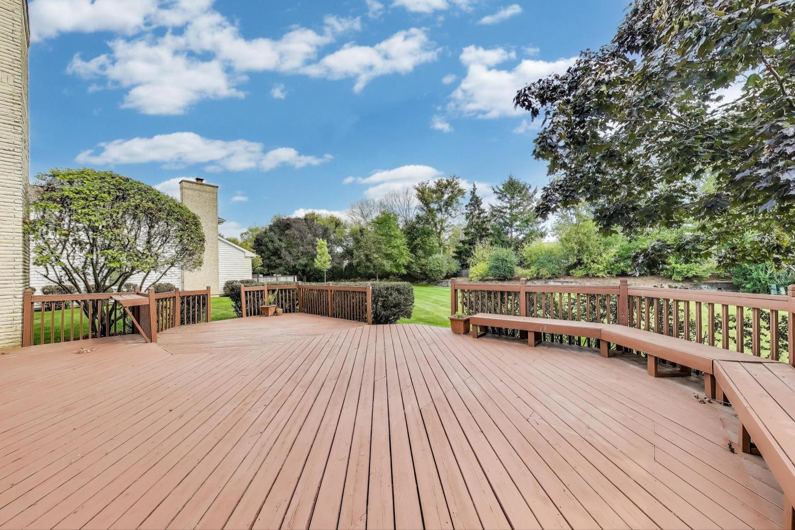 1903 Sheridan Road Buffalo Grove, IL 60089 - Photo 29 of 33 a balcony with wooden floor and fence