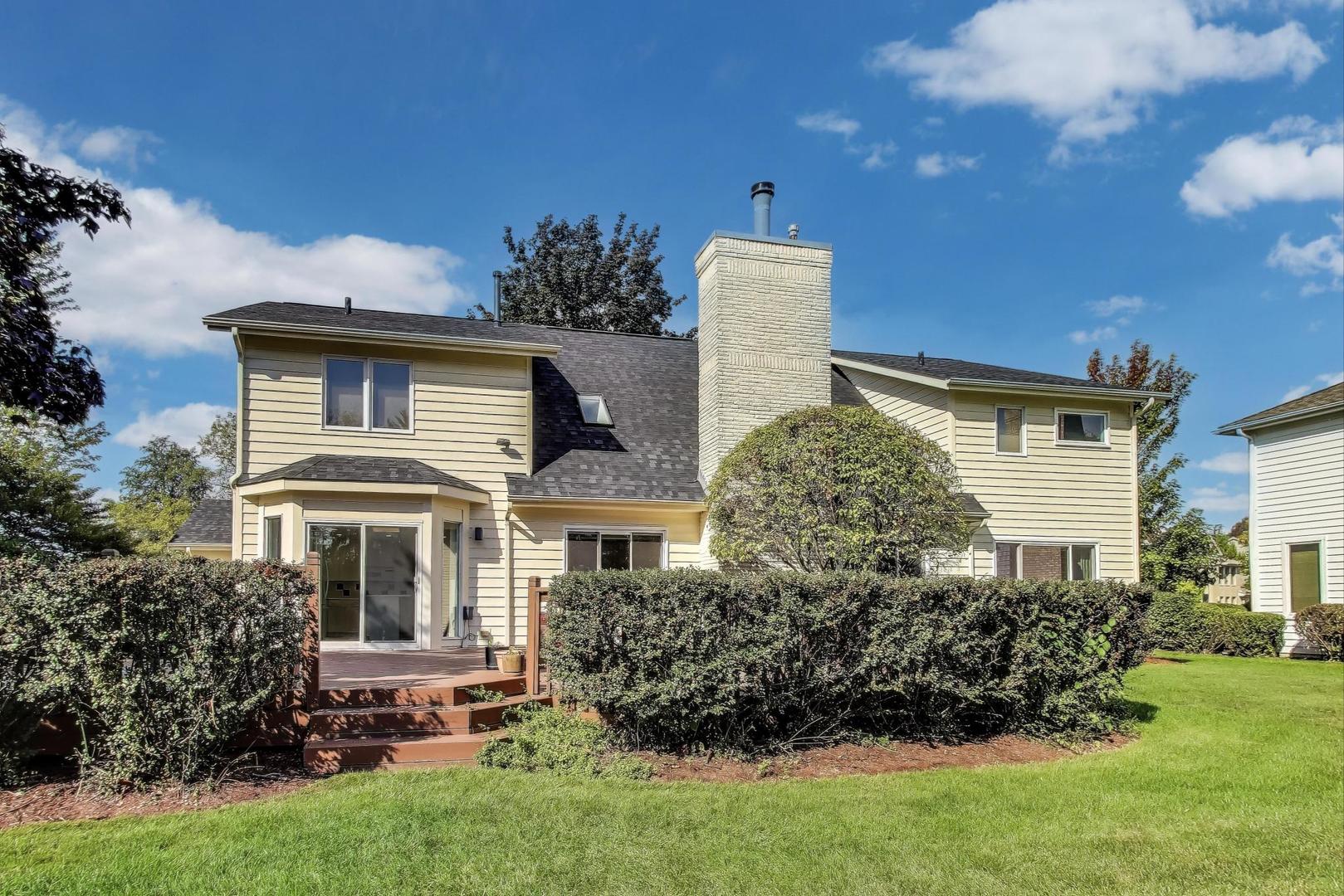 1903 Sheridan Road Buffalo Grove, IL 60089 - Photo 32 of 33 a front view of a house with a garden
