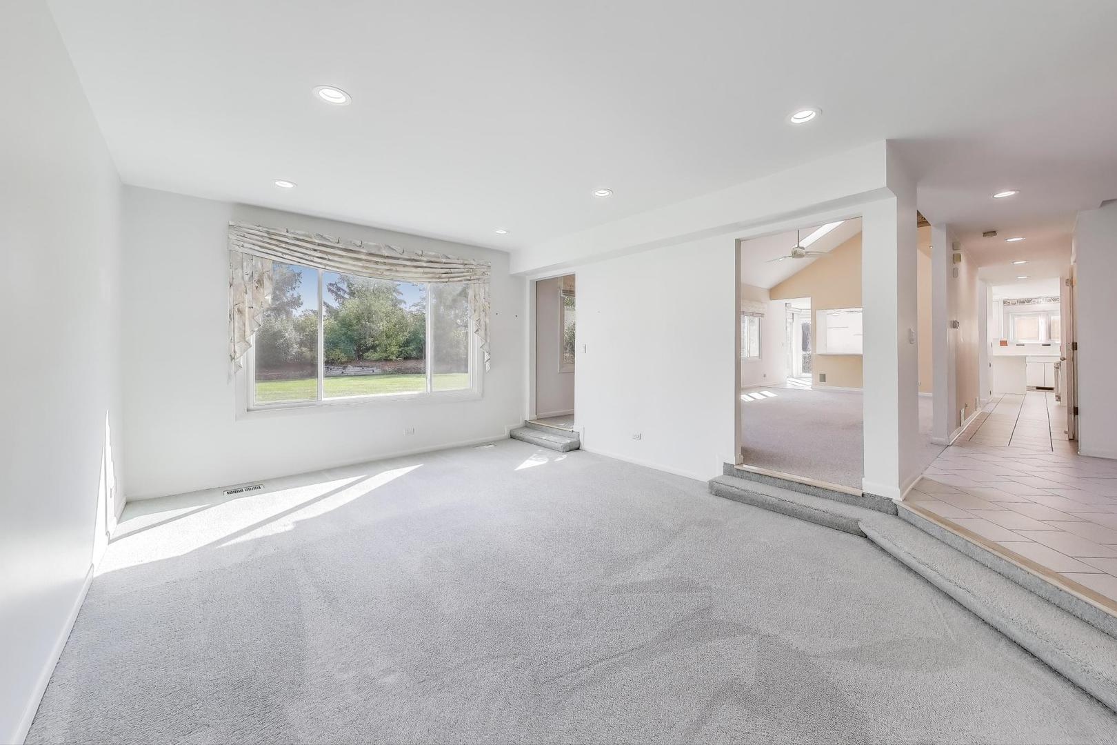 1903 Sheridan Road Buffalo Grove, IL 60089 - Photo 4 of 33 a view of an empty room with a window