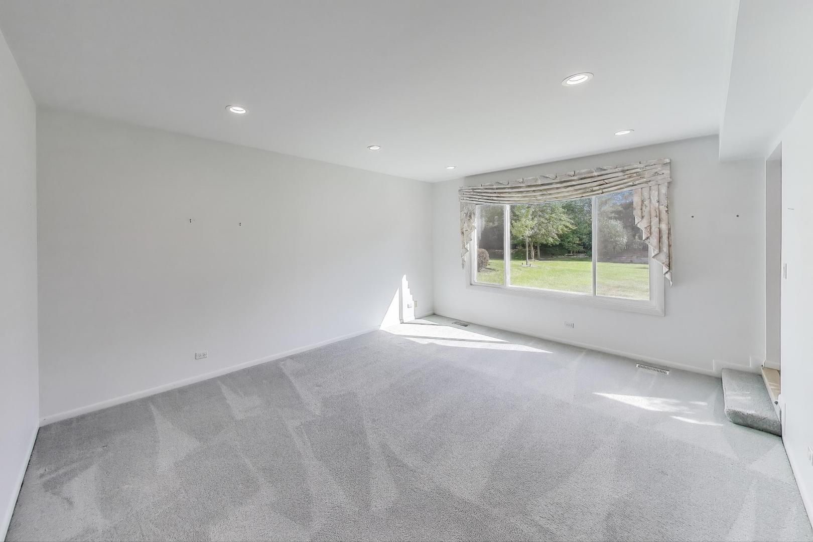 1903 Sheridan Road Buffalo Grove, IL 60089 - Photo 5 of 33 an empty room with a window