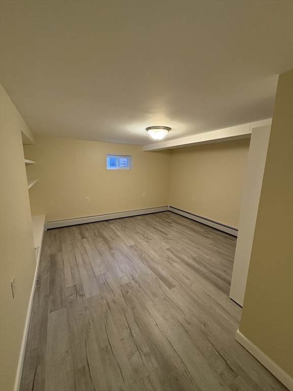 150 West Wrentham Road Cumberland, RI 02864 - Photo 31 of 38 a view of empty room with wooden floor
