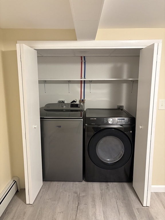 150 West Wrentham Road Cumberland, RI 02864 - Photo 33 of 38 a utility room with a sink dryer and washer
