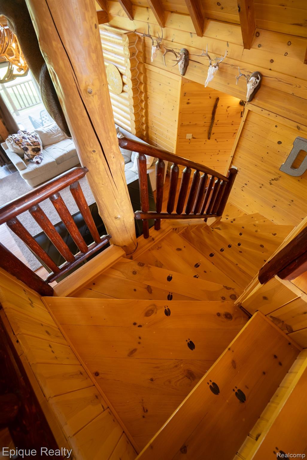 1966 Mayer Road Smiths Creek, MI 48074 - Photo 32 of 38 Wood-finish spiral staircase featuring a solid wood newel post and railings