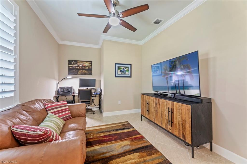 20191 Torch Key Way Estero, FL 33928 - Photo 18 of 39 a living room with furniture