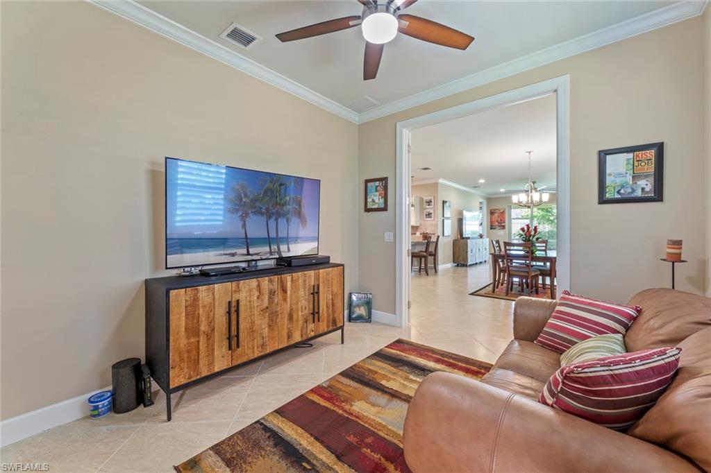 20191 Torch Key Way Estero, FL 33928 - Photo 19 of 39 a living room with furniture and a rug