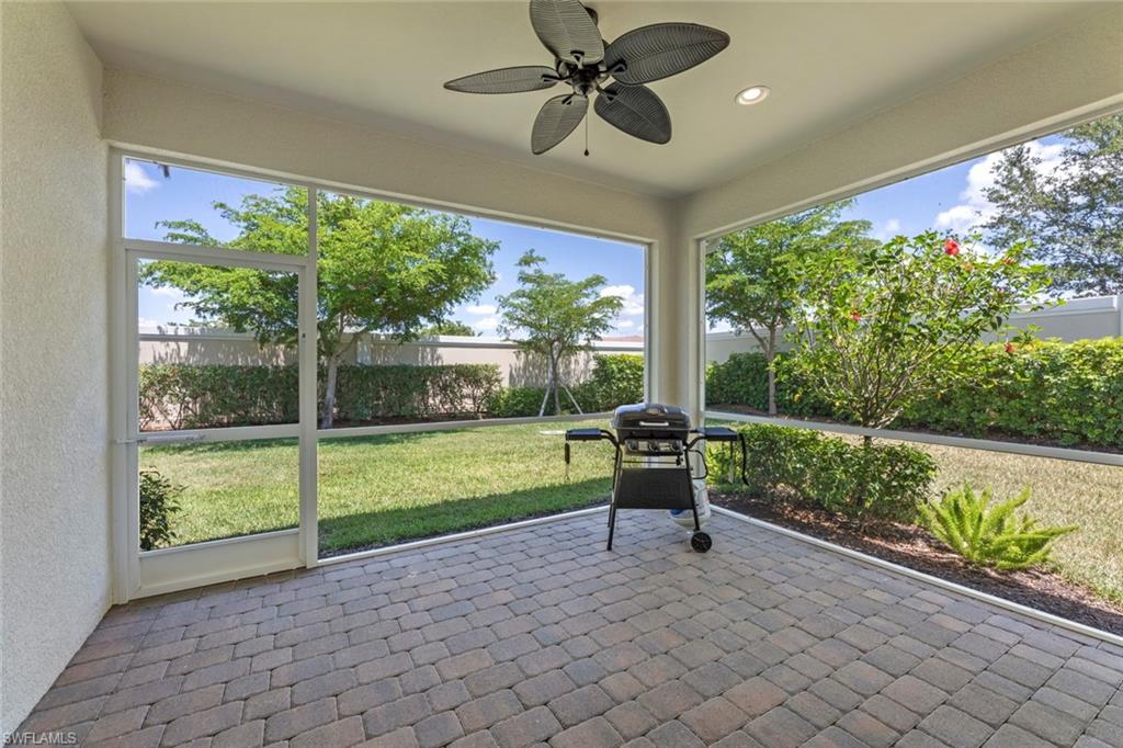 20191 Torch Key Way Estero, FL 33928 - Photo 26 of 39 a view of a porch and garden