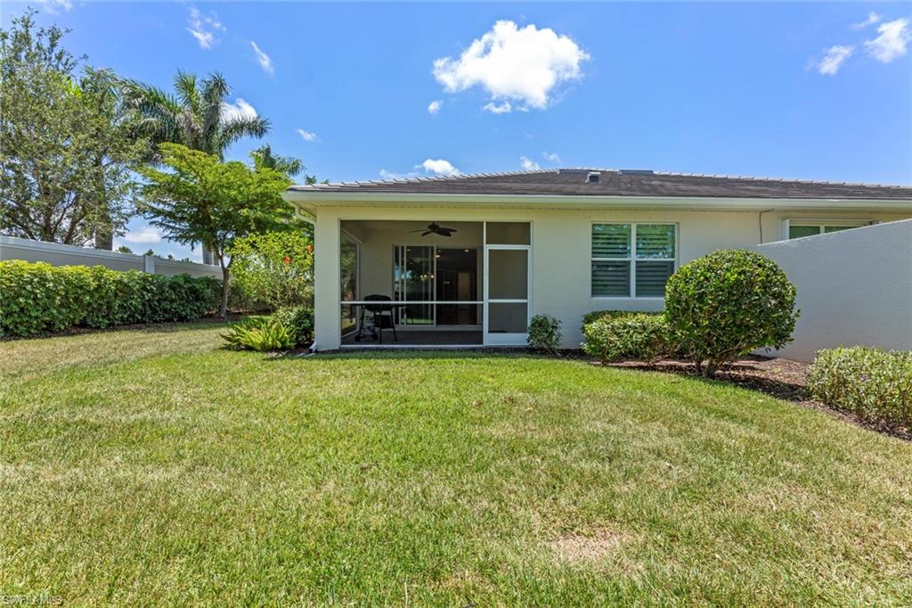 20191 Torch Key Way Estero, FL 33928 - Photo 27 of 39 front view of a house with a yard