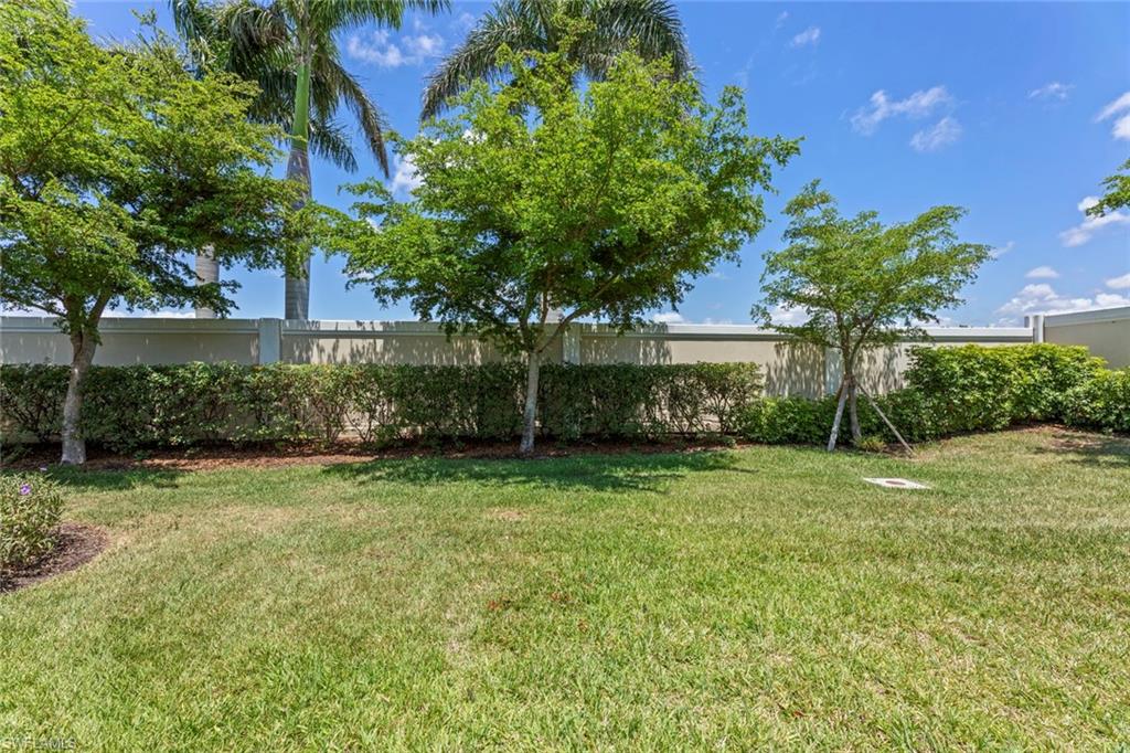 20191 Torch Key Way Estero, FL 33928 - Photo 28 of 39 a view of a back yard