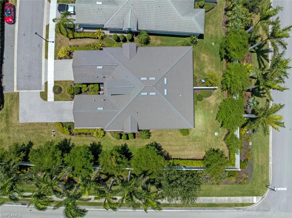 20191 Torch Key Way Estero, FL 33928 - Photo 30 of 39 an aerial view of residential house with yard and swimming pool