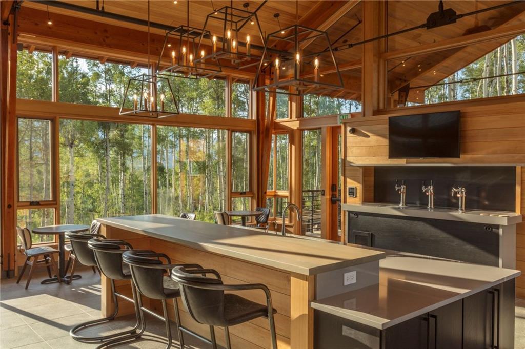 243 McKay Road Silverthorne, CO 80498 - Photo 15 of 16 a view of a dining room with furniture window and outside view