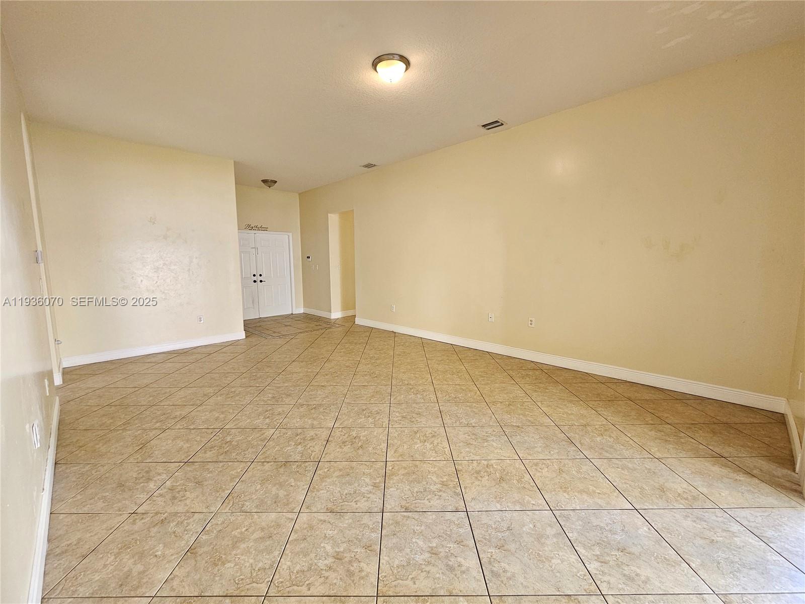 14209 Southwest 160th Court Miami, FL 33196 - Photo 3 of 24 a view of an empty room
