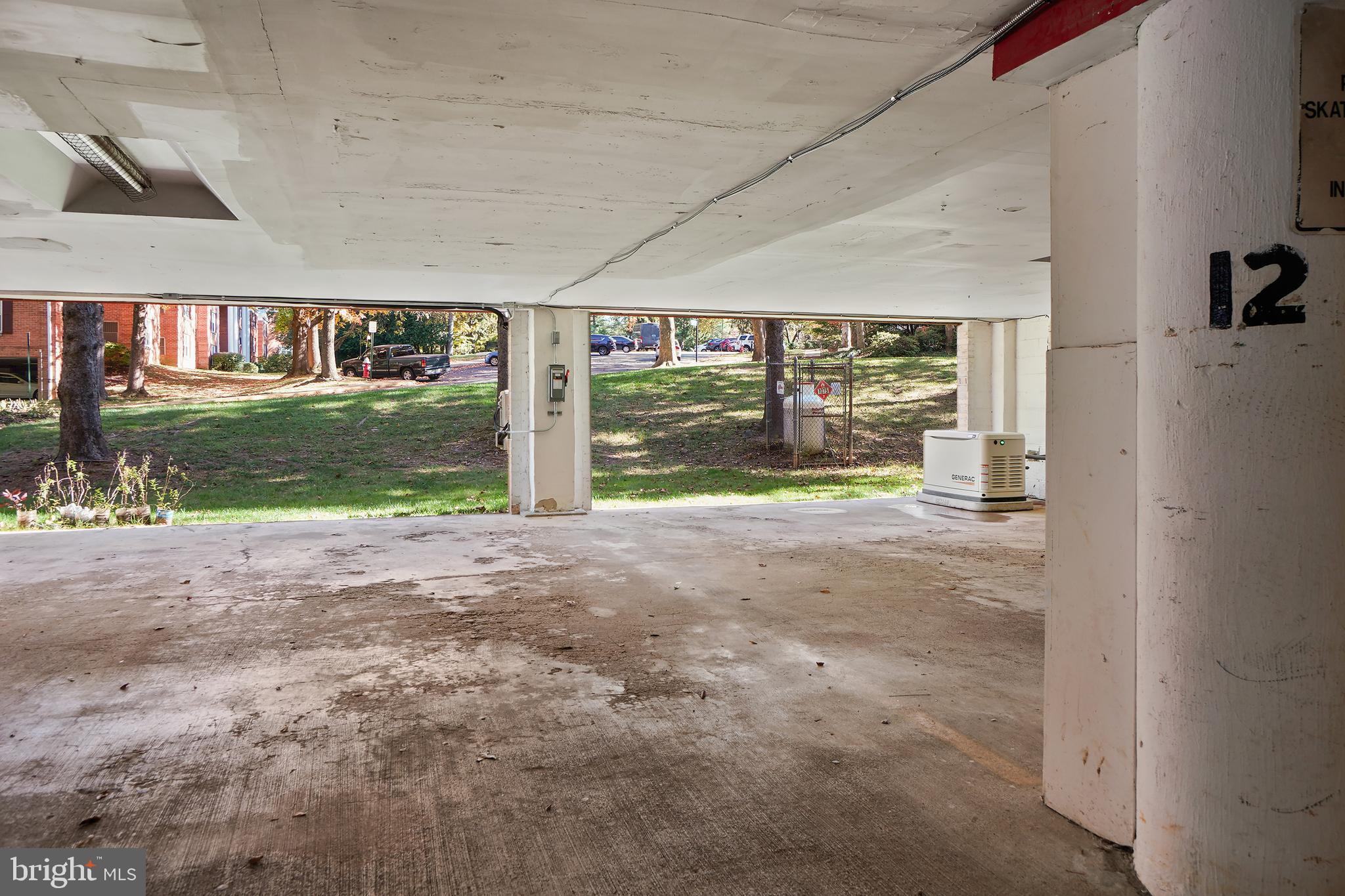 7661 Provincial Drive, Unit 112 McLean, VA 22102 - Photo 19 of 36 a view of a house with a yard