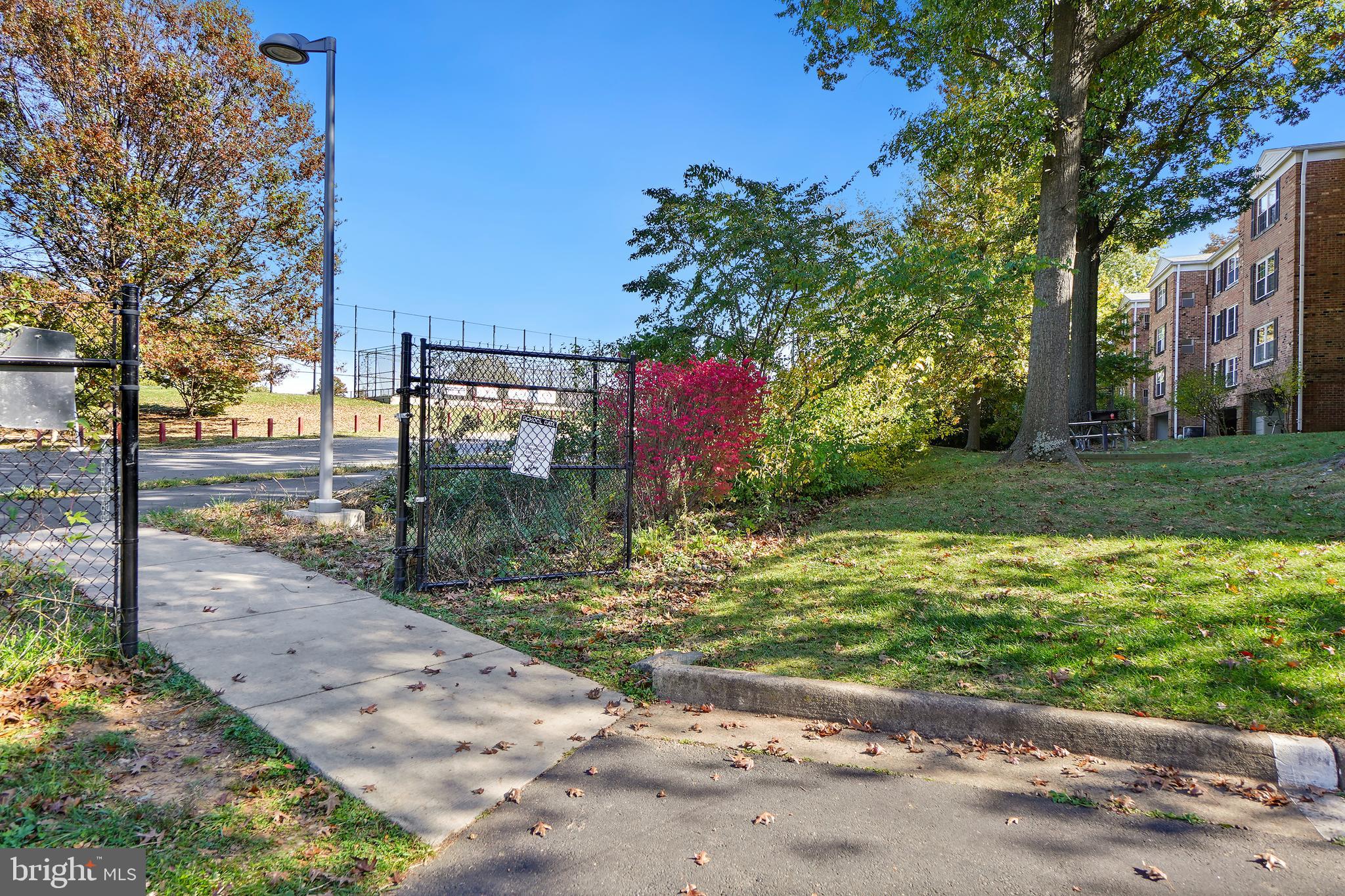 7661 Provincial Drive, Unit 112 McLean, VA 22102 - Photo 25 of 36 a view of a backyard