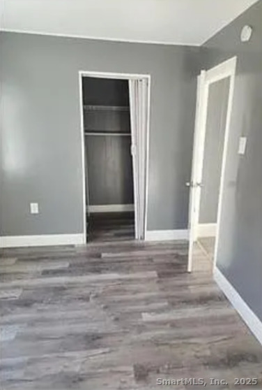 326 Wilmot Avenue Bridgeport, CT 06607 - Photo 4 of 4 a view of empty room with wooden floor