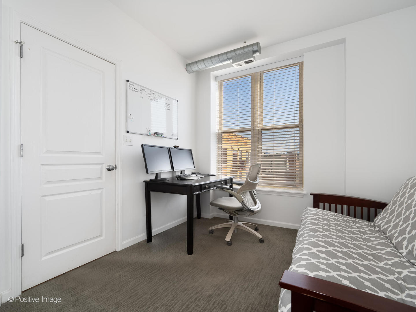 1645 West School Street, Unit 418 Chicago, IL 60657 - Photo 12 of 23 a living room with furniture and a window