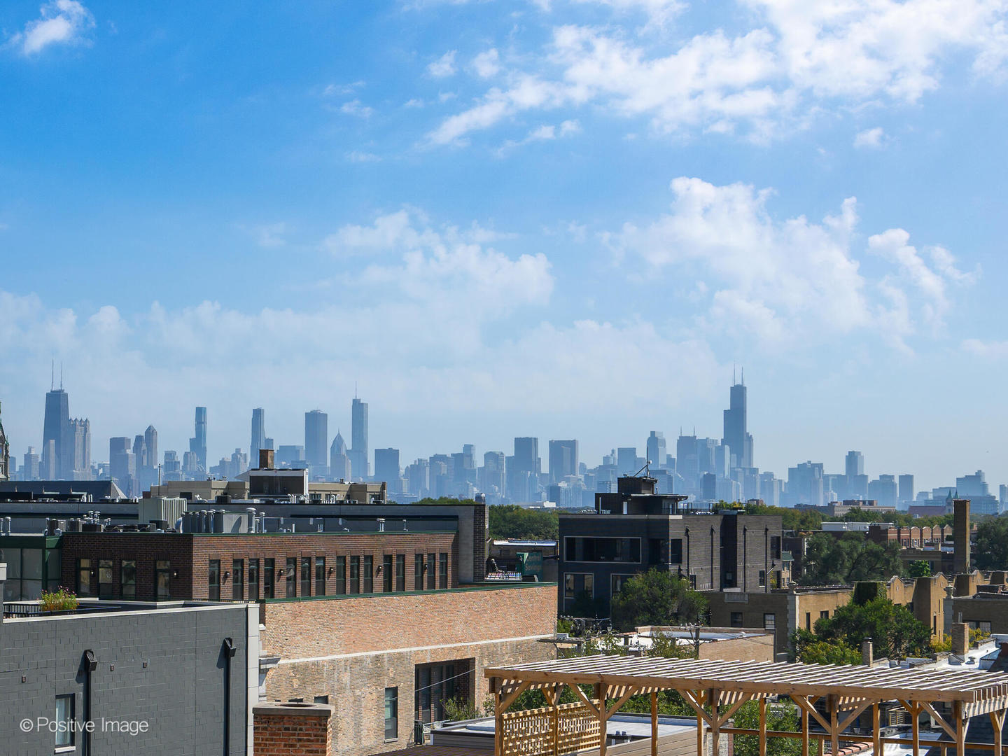 1645 West School Street, Unit 418 Chicago, IL 60657 - Photo 20 of 23 a view of a city with a tall building