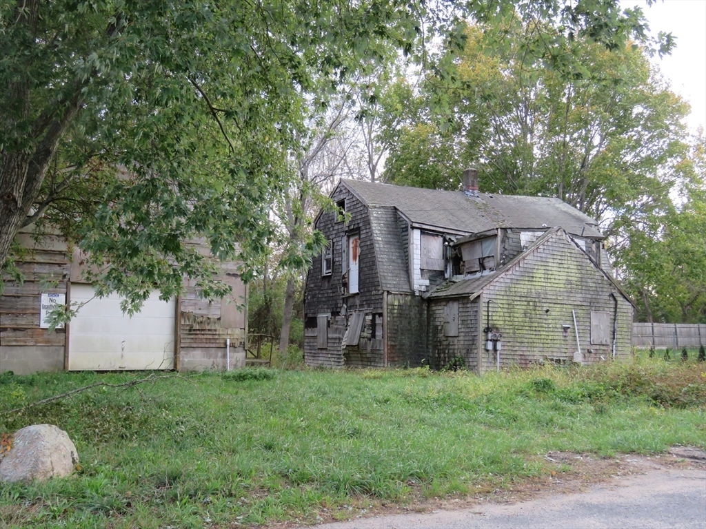 44 Bernard Street Acushnet, MA 02743 - Photo 7 of 7 front view of house with a yard