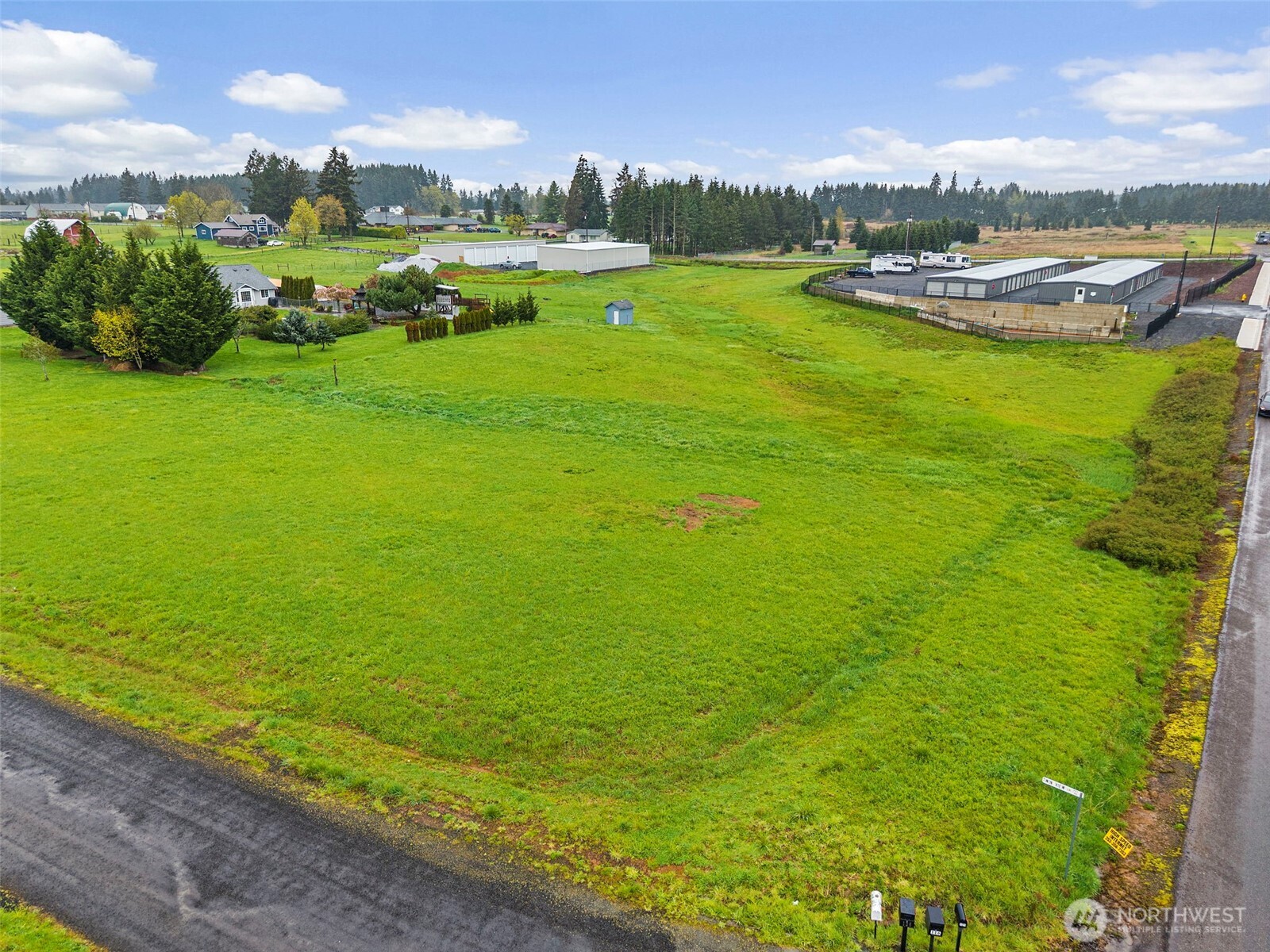 106 Twin View Lane Winlock, WA 98596 - Photo 1 of 4 a view of a lake with lawn chairs
