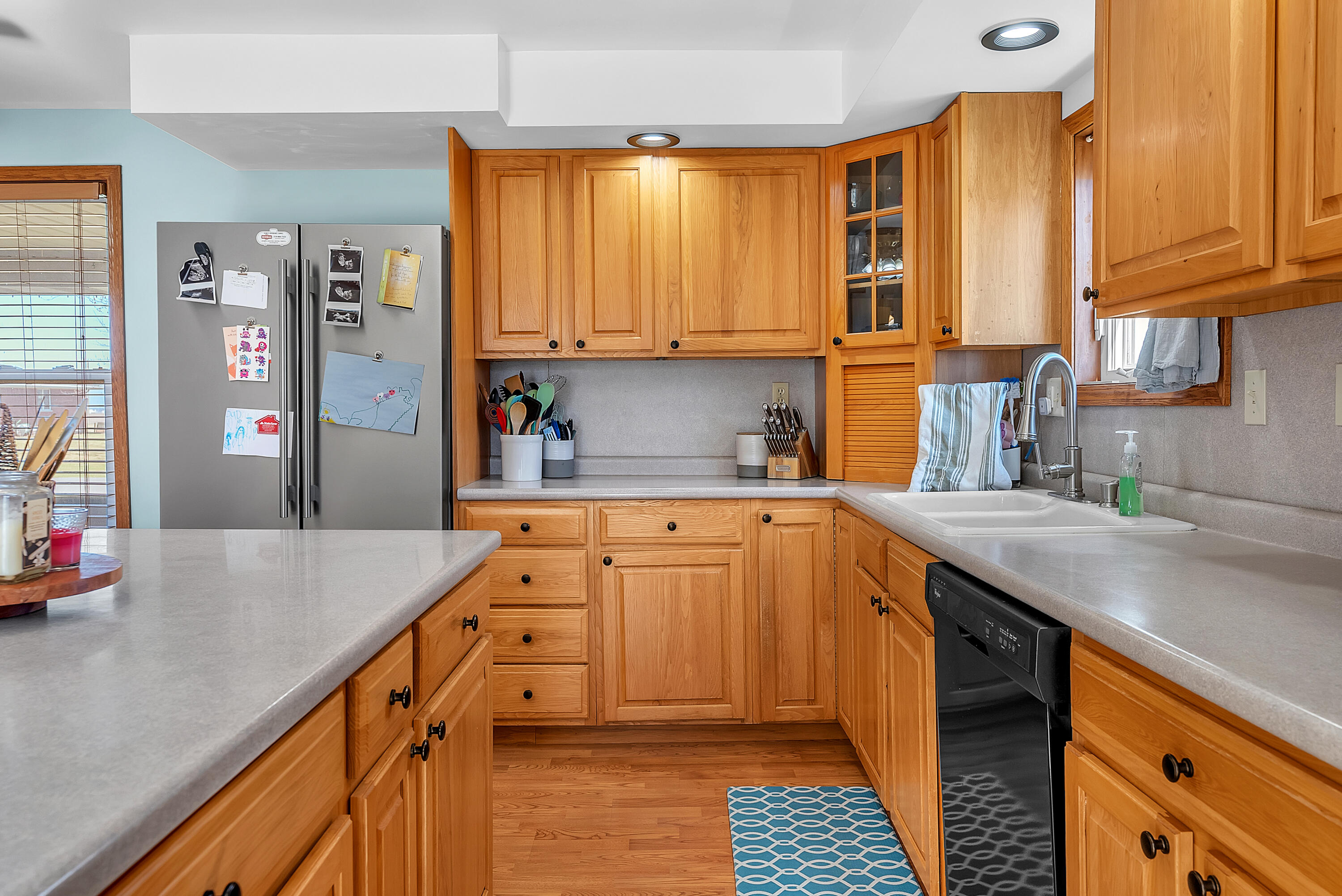 115 West Monroe Street Goodland, IN 47948 - Photo 13 of 36 a kitchen with stainless steel appliances granite countertop a sink a stove and cabinets