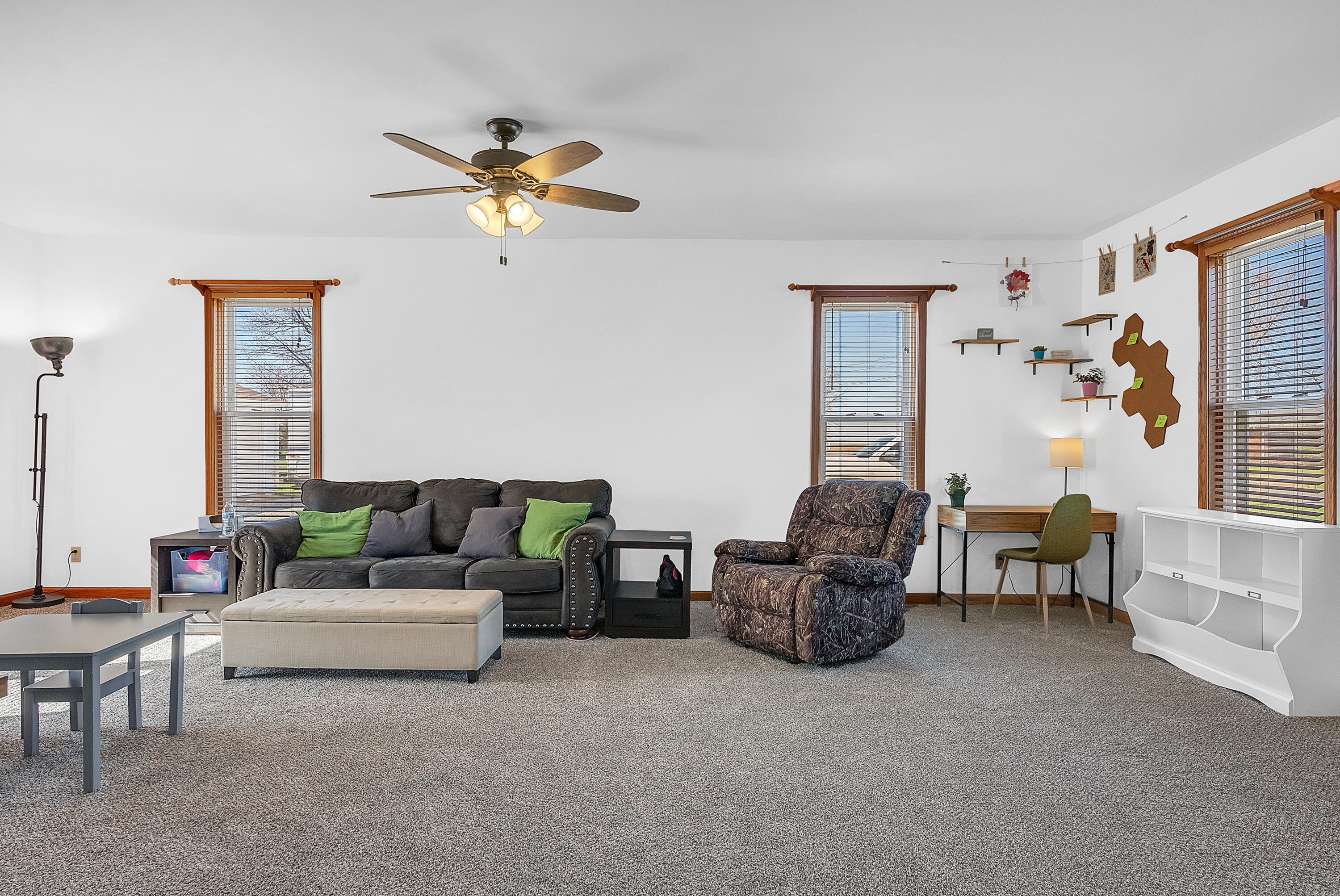 115 West Monroe Street Goodland, IN 47948 - Photo 18 of 36 a living room with furniture and a couch