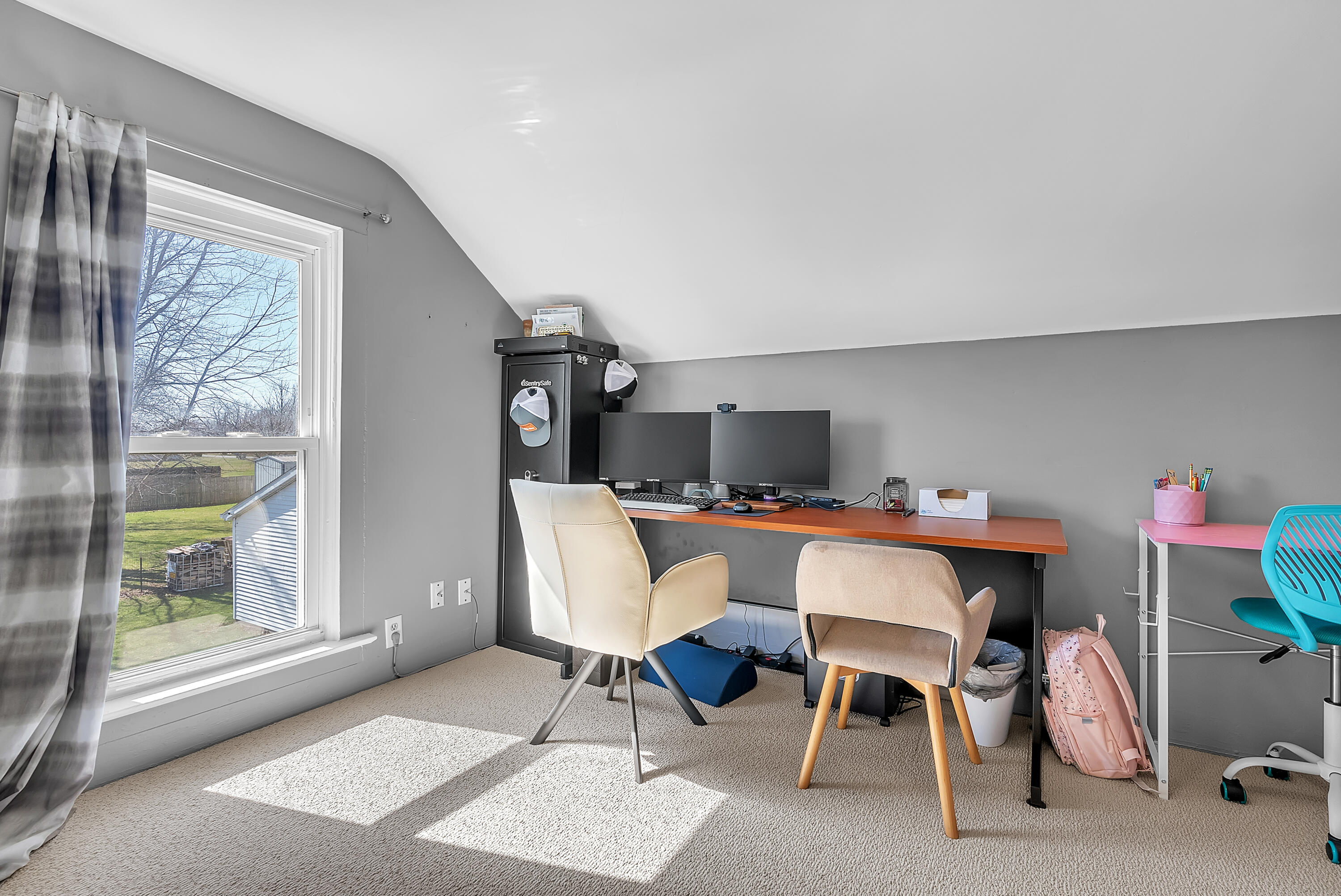 115 West Monroe Street Goodland, IN 47948 - Photo 19 of 36 a workspace with furniture hardwood and a window