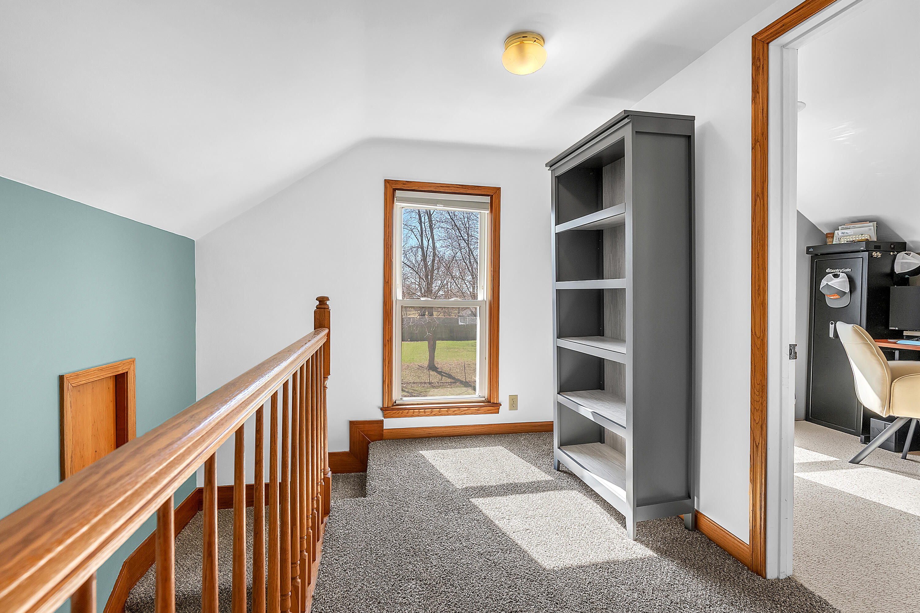 115 West Monroe Street Goodland, IN 47948 - Photo 26 of 36 a view of an entryway with wooden floor and windows