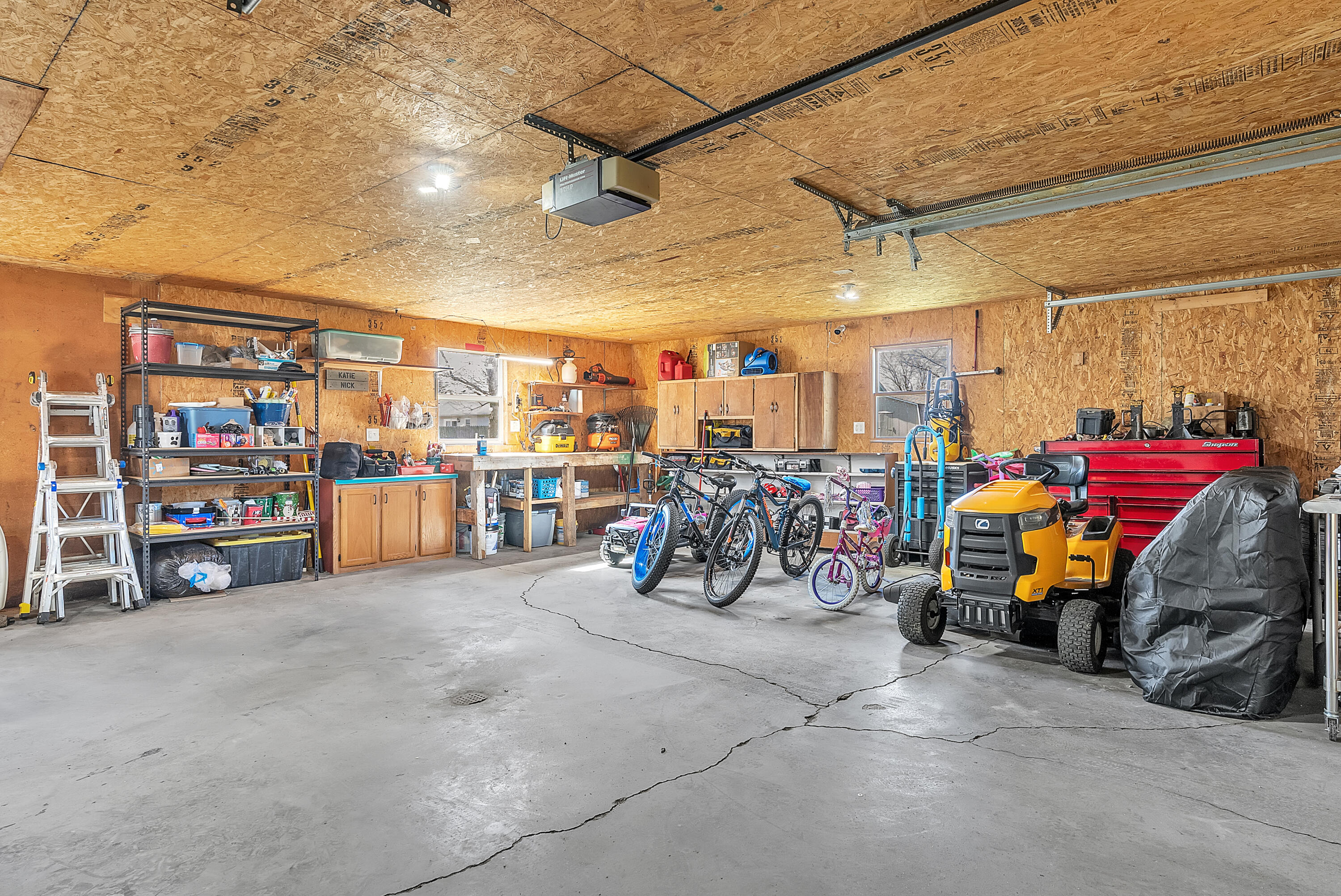 115 West Monroe Street Goodland, IN 47948 - Photo 30 of 36 a view of parking garage with cars