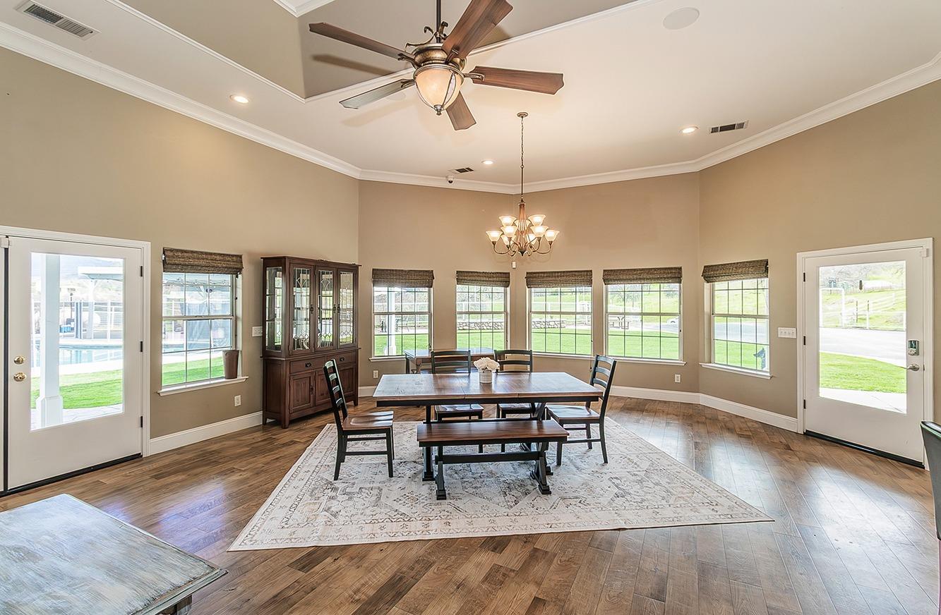21777 Tollhouse Road Clovis, CA 93619 - Photo 12 of 99 a view of a work space with wooden floor and a rug