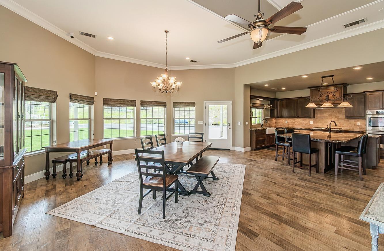 21777 Tollhouse Road Clovis, CA 93619 - Photo 13 of 99 a view of a dining room with furniture window and wooden floor