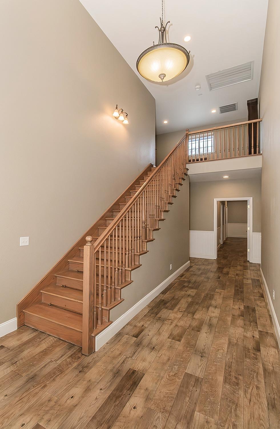 21777 Tollhouse Road Clovis, CA 93619 - Photo 49 of 99 a view of entryway and hall with wooden floor